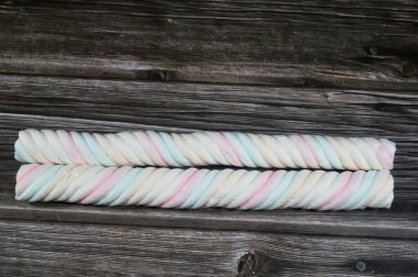 Marshmallows, marshmallow is a confectionery made from sugar, water and gelatin whipped to a solid-but-soft consistency, its naming comes from mallow plant species (Althaea officinalis), pile of candy