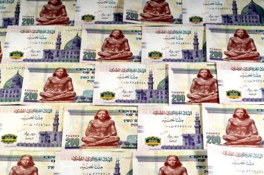 Mısır yığını para yığını. 200 EGP LE, Mısır para döviz kuru ve ekonomi durumu, para konsepti, enflasyon krizi, para birimi ve yatırım banknotları.