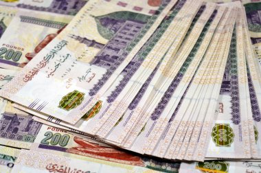 Mısır yığını para yığını. 200 EGP LE, Mısır para döviz kuru ve ekonomi durumu, para konsepti, enflasyon krizi, para birimi ve yatırım banknotları.