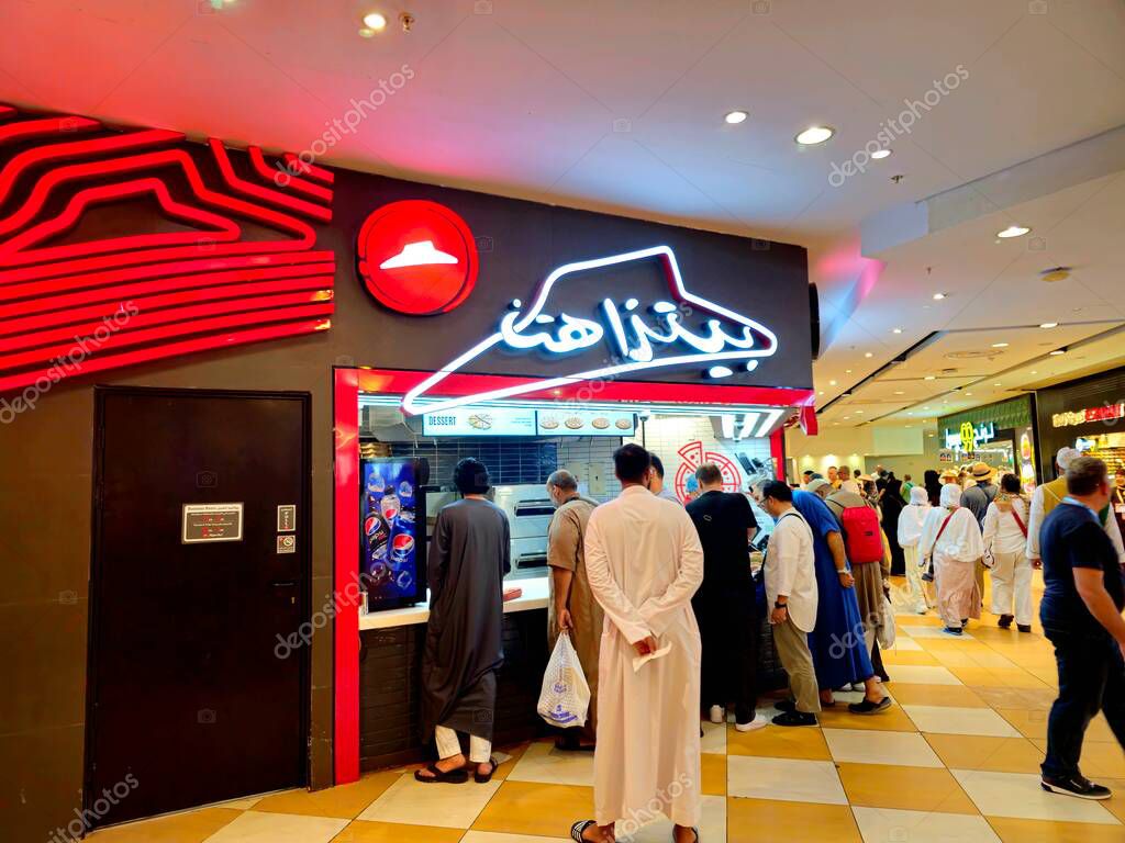 Mecca, Saudi Arabia, June 12 2024: Pizza Hut, LLC, an American multinational pizza restaurant chain and international franchise founded in 1958 in Wichita, Kansas by brothers Dan and Frank Carney