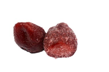 Donmuş Çilek meyvesi, gül familyasından Fragaria cinsinin yaygın olarak yetişen bir melez türü olan Rosaceae, parlak kırmızı rengi, sulu dokusu ve tatlılığıyla karakterize edilen çilekler.