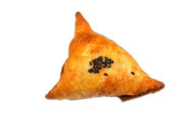 Suriye peyniri ile dolu ve üzeri siyah tohumlarla kaplı bir samosa. Nigella sativa, Savoury dolgulu bir Güney Asya hamur işi. Sambousek genellikle Orta Doğu 'da Ramazan ayında tüketilir.