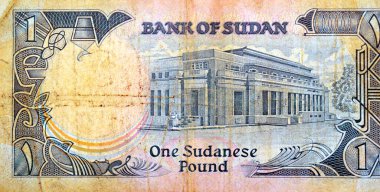 1 SDG 'nin ters tarafının büyük bir kısmı Sudan nakit para banknotu, Hartum' daki Sudan Merkez Bankası binası, Sudan 'ın eski antika parası, seçici odak noktası