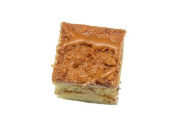 Küçük bir pastanın üzerindeki bisküvi kreması, Gateau ısırıkları çeşitli pasta aromalı ve dolgulu küçük porsiyonlar, minyatür pastalar, ekler, mille feuille ve sünger keki.