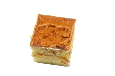 Küçük bir pastanın üzerindeki bisküvi kreması, Gateau ısırıkları çeşitli pasta aromalı ve dolgulu küçük porsiyonlar, minyatür pastalar, ekler, mille feuille ve sünger keki.