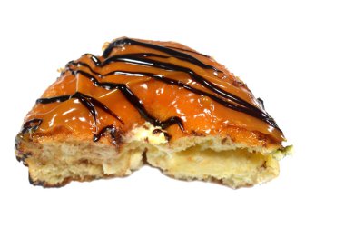 Karamelli jöle ve çikolatalı çörek, jöleli, mayalı, Amerikan usulü yüzük donutu, bol yağda kızartılmış hamur hamurundan yapılmış.