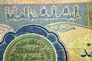 1 IQD 'nin ters tarafından bir madeni para tasarımı 1 Irak Dinarı 1980 Irak Merkez Bankası, eski model Irak nakit para banknotu, seçici odaklı