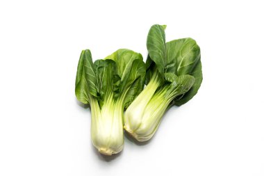 İzole edilmiş taze organik Pak Choi, Bok Choy, Çin lahanası, Çiğ Doğal Sağlıklı Sebzeler Beyaz Arka planda Yatıyor, Düz Yerde, Üst Görüş. Asya mutfağı. Yatay düzlem. Yüksek kalite fotoğraf