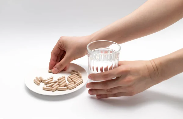 Human Hands Take Pills Capsules Slippery Elm Glass Water Dietary — Stock Photo, Image