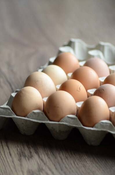 brown eggs on the white table