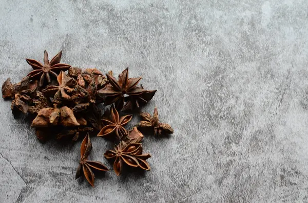 star anise and spices on black background. copy space for text or logo
