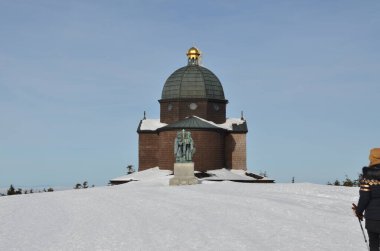 Radhost mountain peak, Chapel of St. Cyril and Methodius, their statue and transmitter, Beskydy, Czech Republic clipart