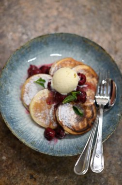 delicious pancakes with berries on a plate