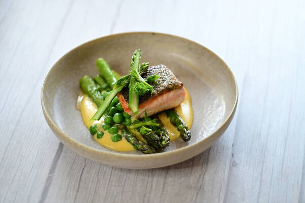 Delicious Baked Salmon with Hollandaise Sauce and Asparagus  A Springtime Delight