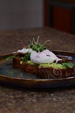 toast with avocado and poached egg