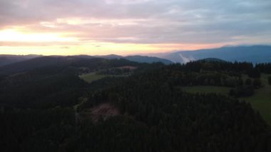 sunset over a mountain range in the carpathians