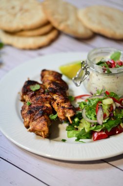 kebab on white plate