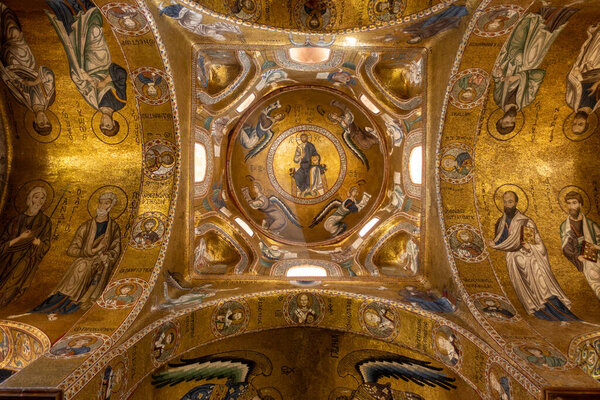 Sicily, Ceiling of the Arab-Norman Byzantine Cathedral of St. Mary of the Admiral, The Martorana Church, with a golden mosaic of a Christ Pantocrator. Palermo, Italy