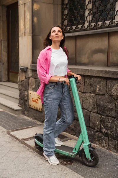 Smiling Young Woman Casual Pink Shirt Ride Electric Kick Scooter — Stock Photo, Image