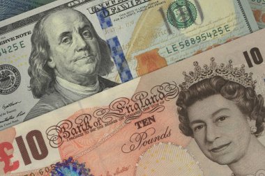 İngiliz sterlini ve Amerikan doları banknotları. Nakit. Mali konsept.