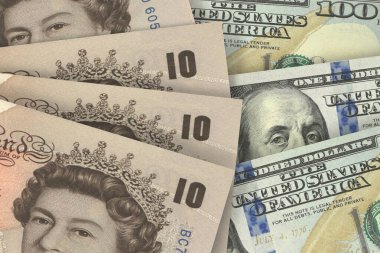 İngiliz sterlini ve Amerikan doları banknotları. Nakit. Mali konsept.