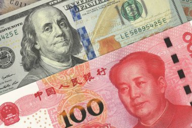 Çin Yuanı ve Amerikan Banknotları. Nakit. Mali Konsept.