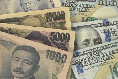 Japon Yen ve Amerikan Banknotları. Nakit. Mali Konsept.
