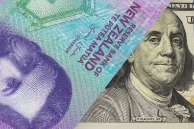 Dolar banknotunda ABD Başkanı 'nın portresi Yeni Zelanda dolar banknotunun altından görünüyor. Para piyasası. Finans kavramı