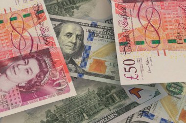 İngiliz sterlini ve Amerikan doları banknotları. Nakit. Mali konsept.