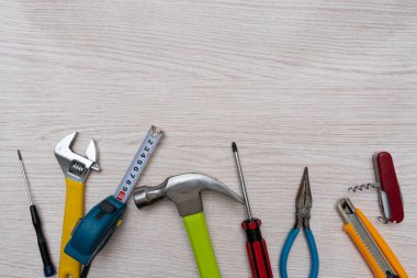 Various household tools such as hammer and tape measure screwdriver