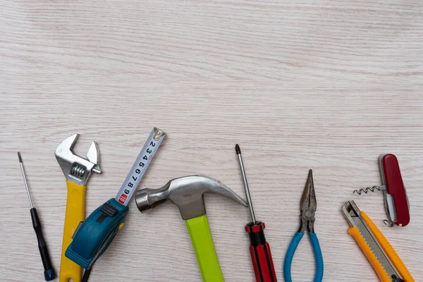Various household tools such as hammer and tape measure screwdriver