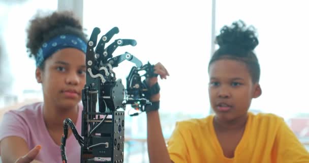 African Black Kids Playing Robotic Arm School Group Student Controlled — Stock Video