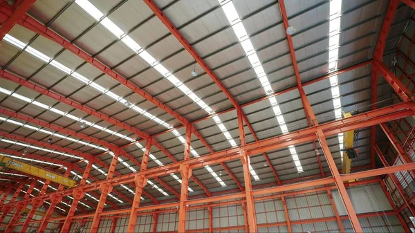 Large industrial buildings or factory with steel structures. Large industrial hall. Factory or warehouse