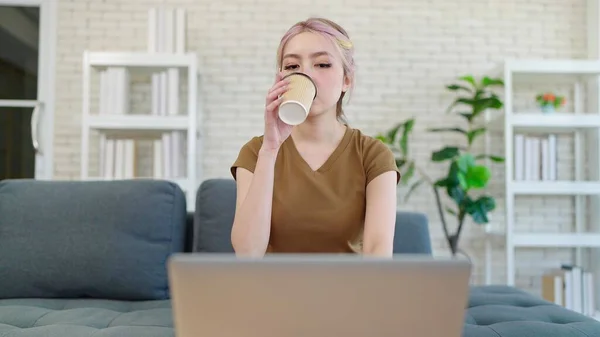 Young Asian Drinking Coffee While Working Laptop Home Woman Freelancer — Stock Photo, Image