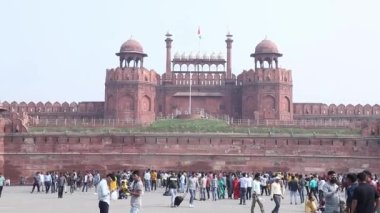 Video of a tourist in front of Lal Qila, New Delhi, India.