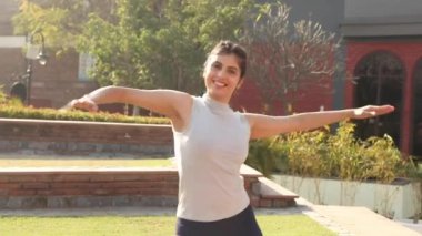 Video of Sporty girl performing full body fat burning aerobic dance.