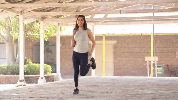 Video Slim Woman Doing Butt Kicks Aerobic Cardio Exercise — Video