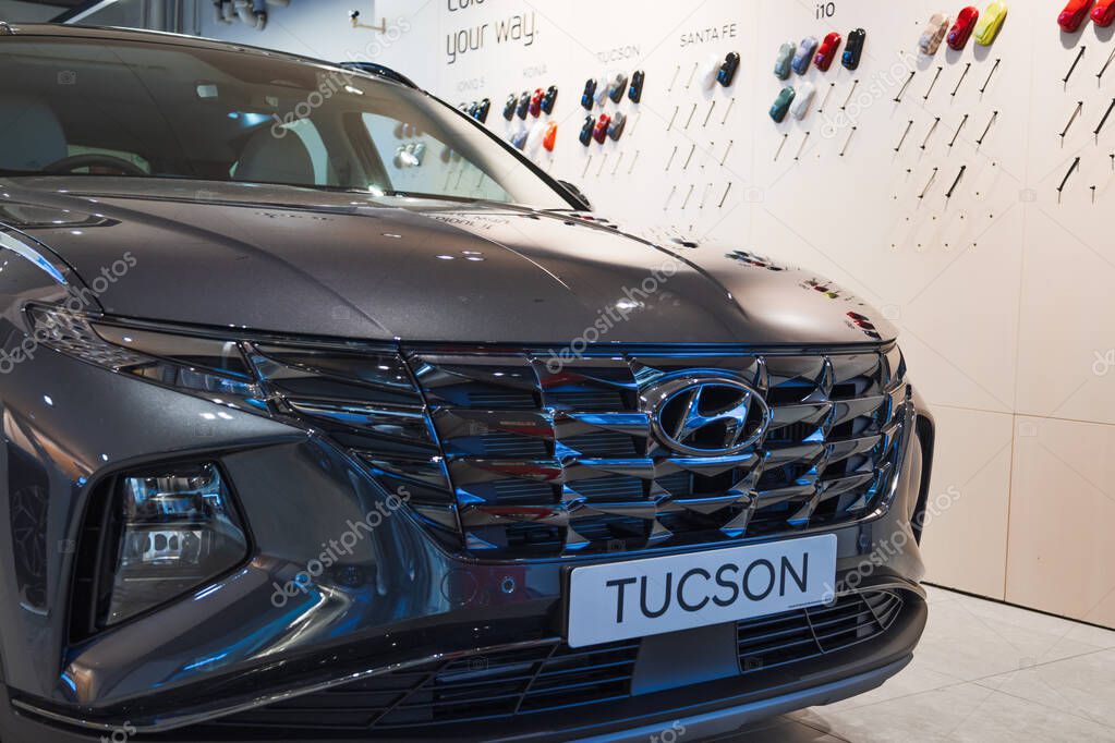 Close up of Hyundai Tucson front grille and logo at a car showroom. London, UK, 10 February 2024