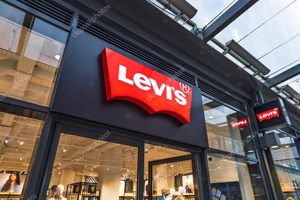 Levis denim store with bright signage and inviting modern retail environment. London, UK, 17 March 2024