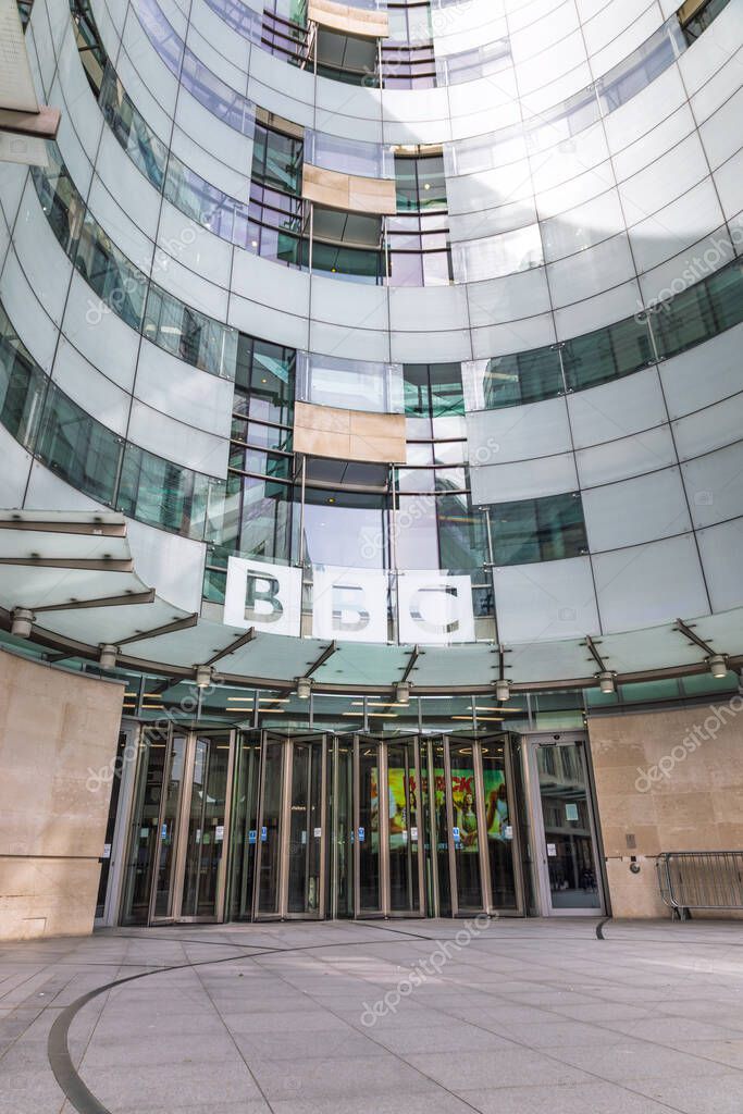 Exterior view of the BBC British Broadcasting House in London with glass architecture and logo. London, UK, 14 April 2024