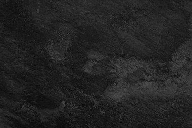 Kusursuz karanlık kaya yüzeyi modern asgari titreşim ve dramatik kontrast sağlar..