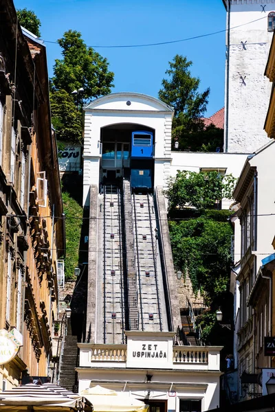 ZAGREB, CROATIA - JULY 22, 2022: Zagreb funicular, connects the lower town of Zagreb with the upper town and is 66 m long with a height difference of 31 m, one of the shortest funiculars in the world.