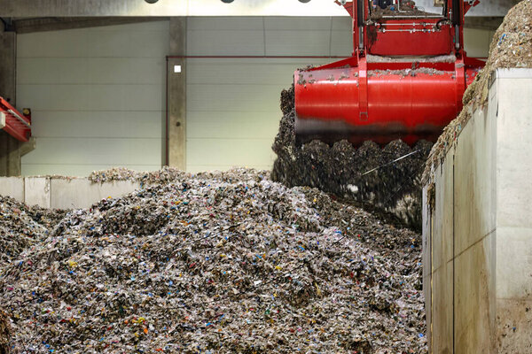 Waste derived fuel dump . Handling and Transportation of fuel obtained from waste (RDF) by red grab to the boiler for combustion.  Processing of municipal solid waste into an energy source.