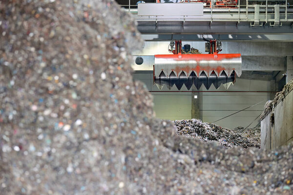 Waste derived fuel dump . Handling and Transportation of fuel obtained from waste (RDF) by red grab to the boiler for combustion.  Processing of municipal solid waste into an energy source.