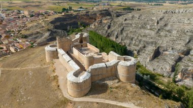 views of the beautiful castle of Berlanga de Duero in the province of Soria, Spain clipart