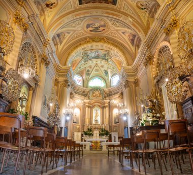 Loano Italy 17 April 2024: Interior of the Oratorio delle Cappe Bianche church, home of the Confraternity of the White Disciplinants clipart