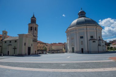 Central square of Loano with the cathedral of San Giovanni Battista clipart