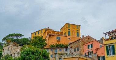 Alley of the old village of Loano in Liguria clipart