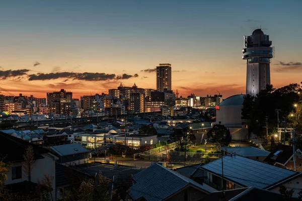 stock image After sunset glow behind Akashi clocktower and city in early evening. High quality photo