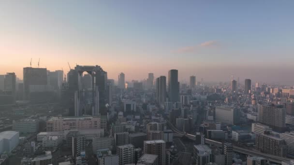 Slow Pan Sky Building Downtown Osaka Sunrise Hazy Morning Burning — Video
